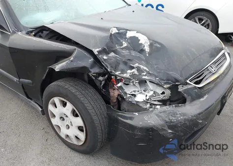 1998 Honda Civic Lx z USA, uszkodzony, nr VIN JHMEJ6677WS017027